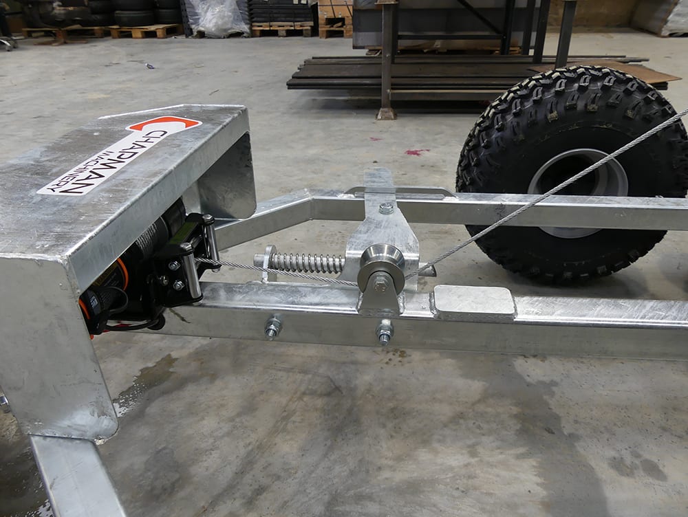 Chapman BT500 ATV Bale Transporter trailer with electric winch; galvanized metal frame and rugged off-road tire.