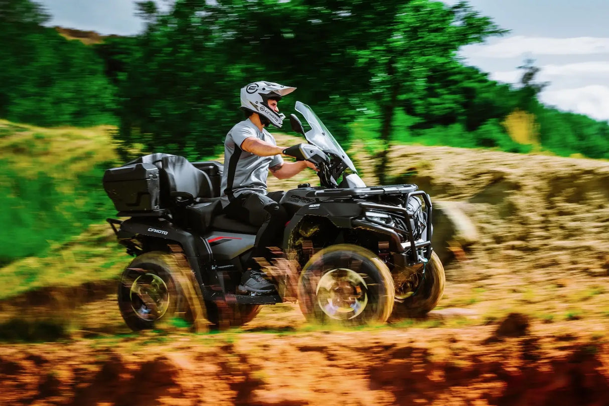 CFMOTO CForce 625 Touring Overland ATV, Granite Ridge gray, with rear cargo boxes.