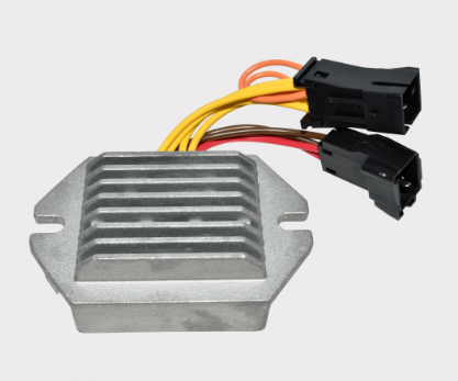 Voltage regulator for Polaris Indy/Pro RMK/Switchback/Rush snowmobiles with yellow and red leads and dual connectors.