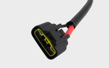 REVOLT regulator rectifier connector for Victory motorcycles; black housing with yellow seal and red and black wires
