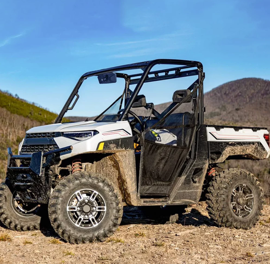 Rear View Mirror for Polaris Ranger UTV by DGT Agri, white vehicle with black roll cage and muddy tires