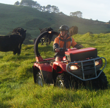 LED Light Kit – Trax LifeGuard, Black, mounted on a red ATV in a grassy field.