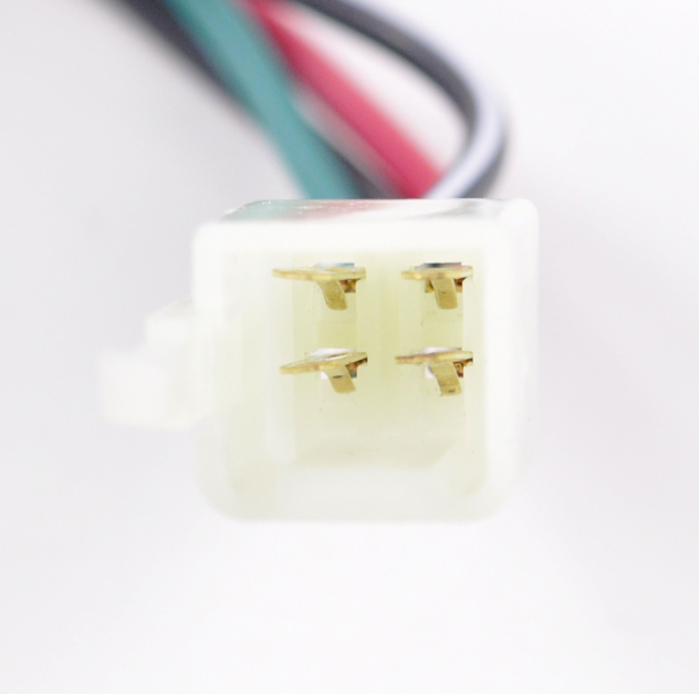 Ignition key switch connector, white housing with four gold pins and green, red, black, white wires.