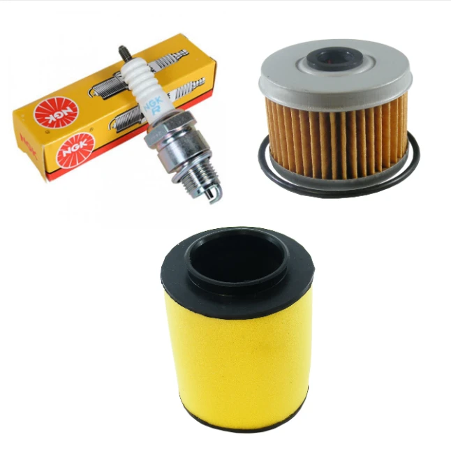 Honda TRX 350 Rancher service kit 2000-2006: NGK spark plug, yellow oil filter, brown pleated air filter.