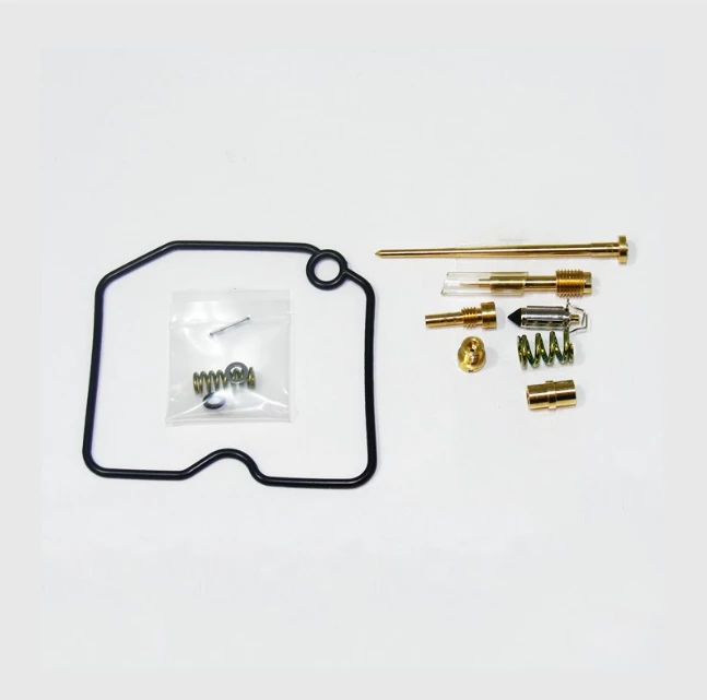 Carburetor rebuild kit for Kawasaki KLF 400 ATV, 1993–1995, with black gasket and brass components.