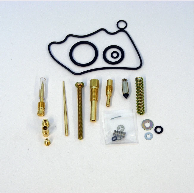 Carburetor rebuild kit for Honda ATV TRX 500FA/FGA; brass components, black rubber gaskets, and springs.