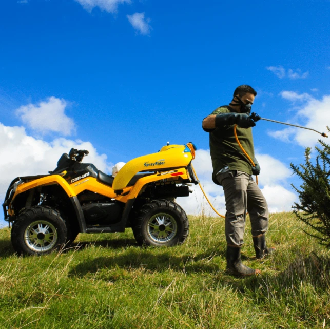 C-Dax SprayRider 80 ATV sprayer on yellow quad, 80L tank.