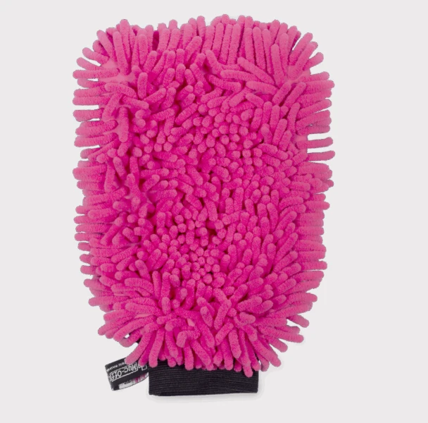 Muc-Off 2-in-1 microfiber wash mitt in pink with black strap, textured chenille fibers for ATV and motorcycle cleaning.