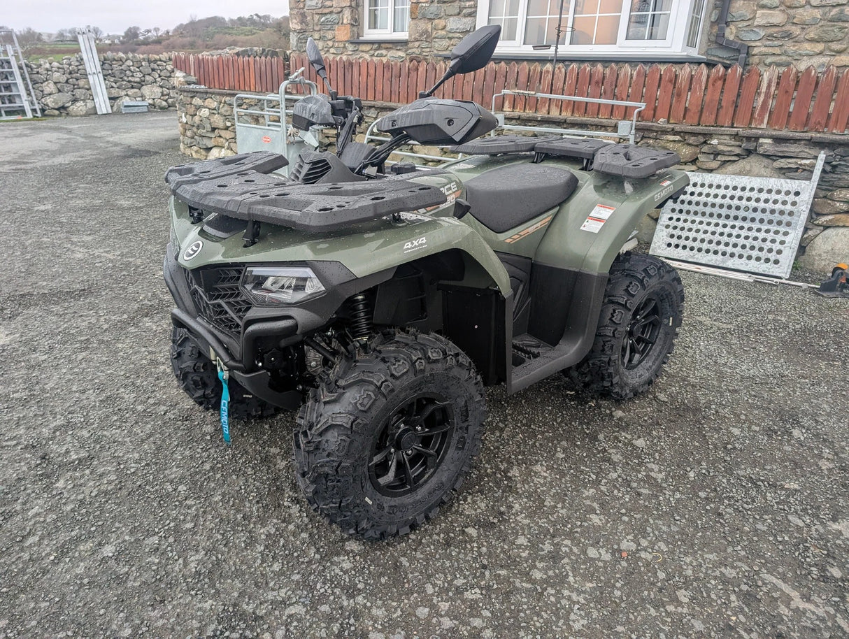 CFMOTO CFORCE 520 ATV in olive green with front and rear racks and rugged tires