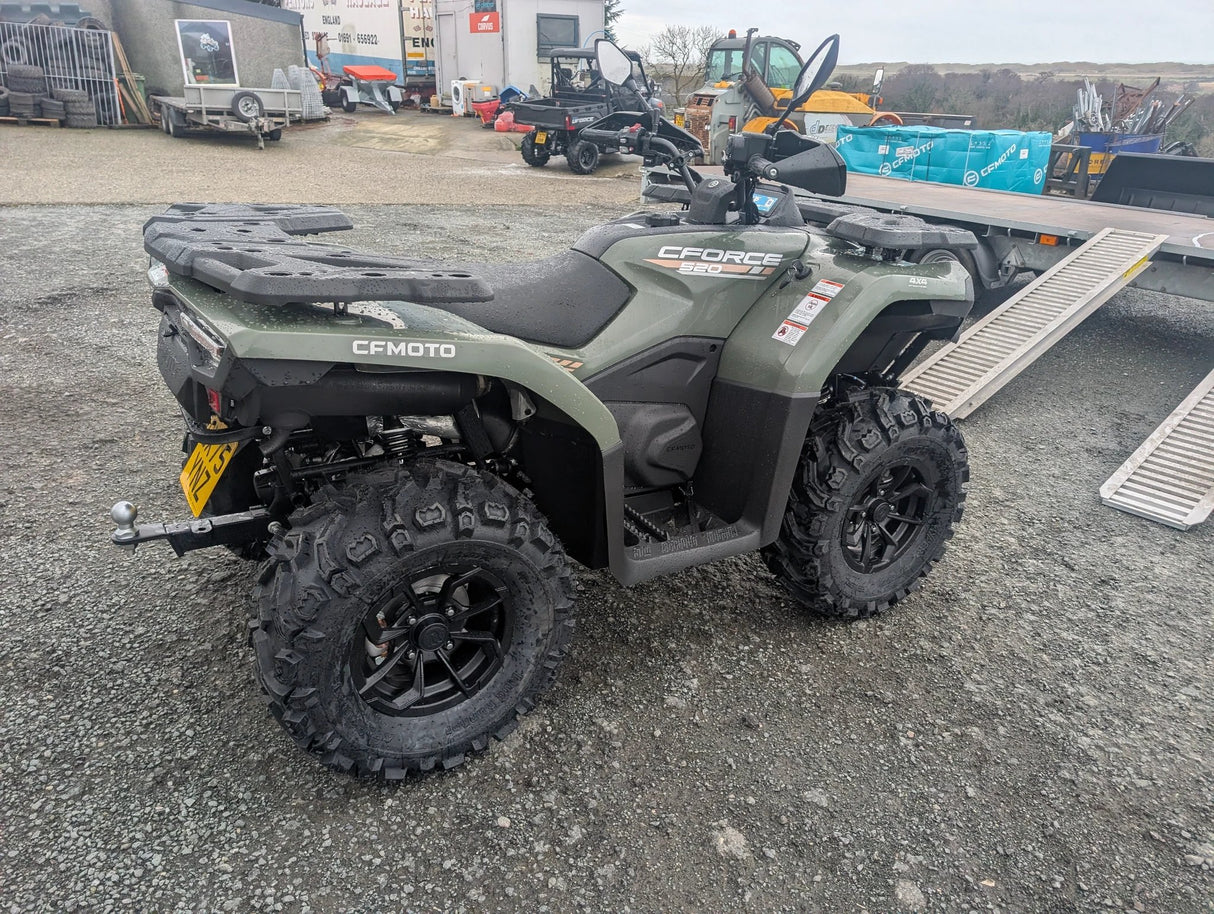 CFMOTO CFORCE 520 2026 ATV, olive-green 4x4 with rugged tires on trailer