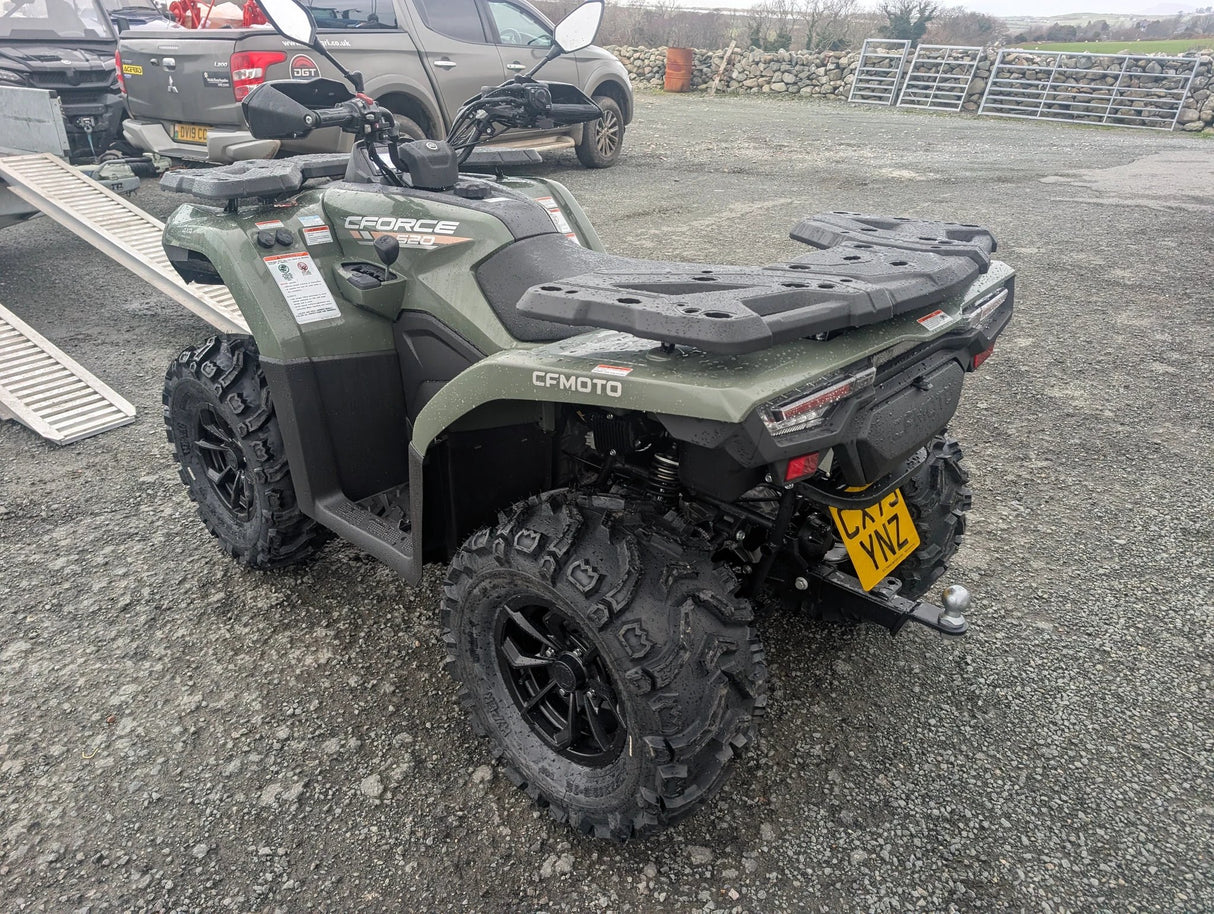 CFMOTO CFORCE 520 ATV in olive green; mid-size with rugged off-road tires and rear rack.