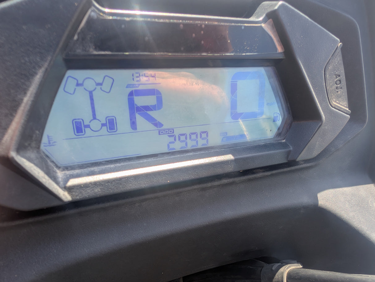 Used CFMOTO CFORCE 450 ATV instrument cluster with blue digital speedometer display