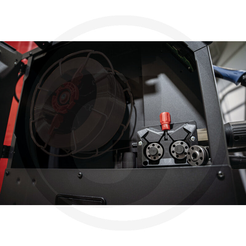 TRAXOR Multi 320+ Welding Machine interior with cooling fan and red control knob