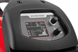Telwin Technomig 210 welder with red body and gray Synergic control panel featuring two knobs.