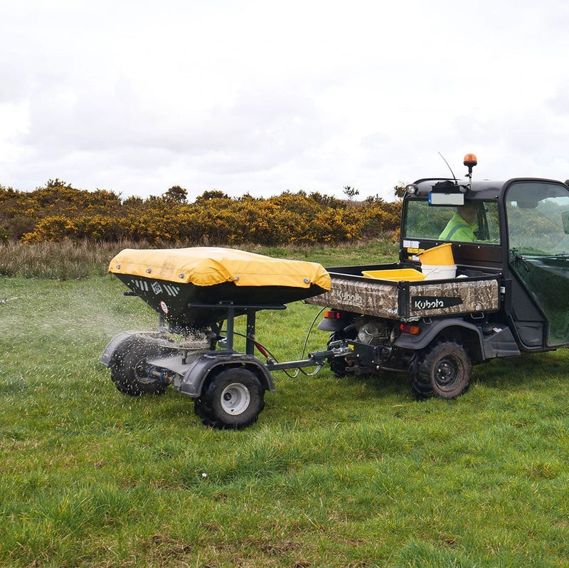JFC Agri ATV fertiliser spreader on Kubota utility vehicle; yellow cover, manual control, 500kg hopper, 14m spread