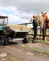 JFC Agri ATV Tip Assist Trailer in black with gas-strut tipping, 500kg capacity; loaded with hay.