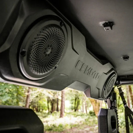 CFMOTO UFORCE U10 Pro full-cab UTV interior with two round speakers and visible CFMOTO branding.