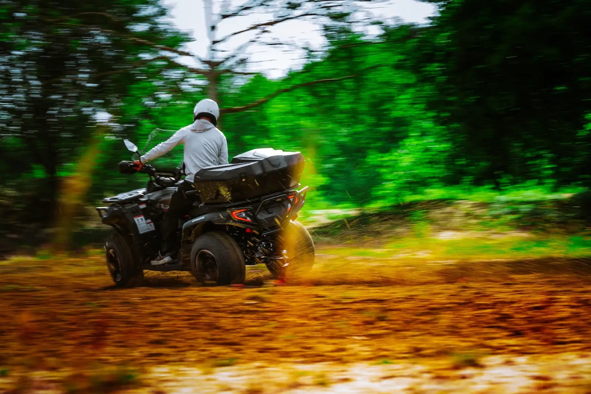 CFMOTO CForce 625 Touring Overland ATV with ABS in Granite Ridge on a dusty forest trail