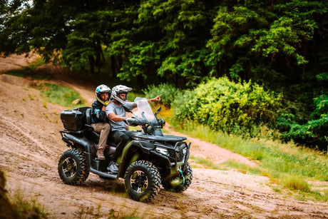 CFMOTO CForce 625 Touring Overland ATV on dirt trail, Granite Ridge color, two riders wearing helmets