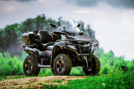 CFMOTO CForce 625 Touring Overland ATV in Granite Ridge gray with ABS; front windscreen and rear cargo boxes