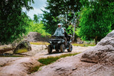 CFMOTO CForce 625 Touring Overland ATV in Granite Ridge with ABS, two riders on rugged trail