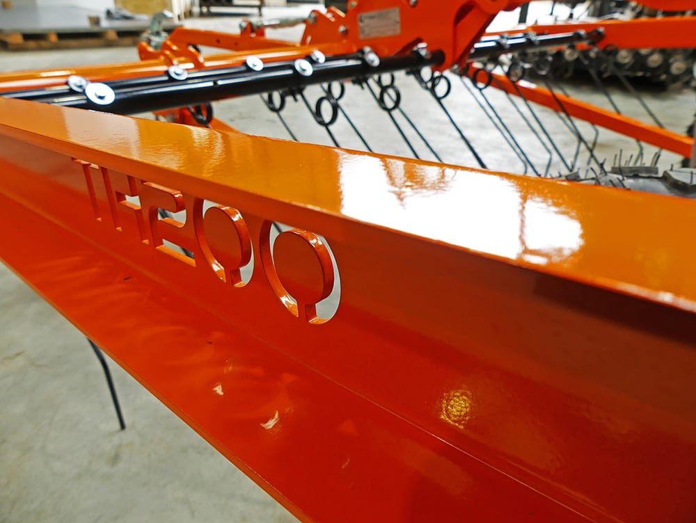 Chapman TH200 tine harrow on bright orange frame with 40 spring tines