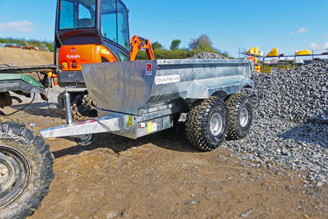 Chapman DT100 hydraulic dump trailer; metallic silver, 2-axle ATV/UTV utility trailer