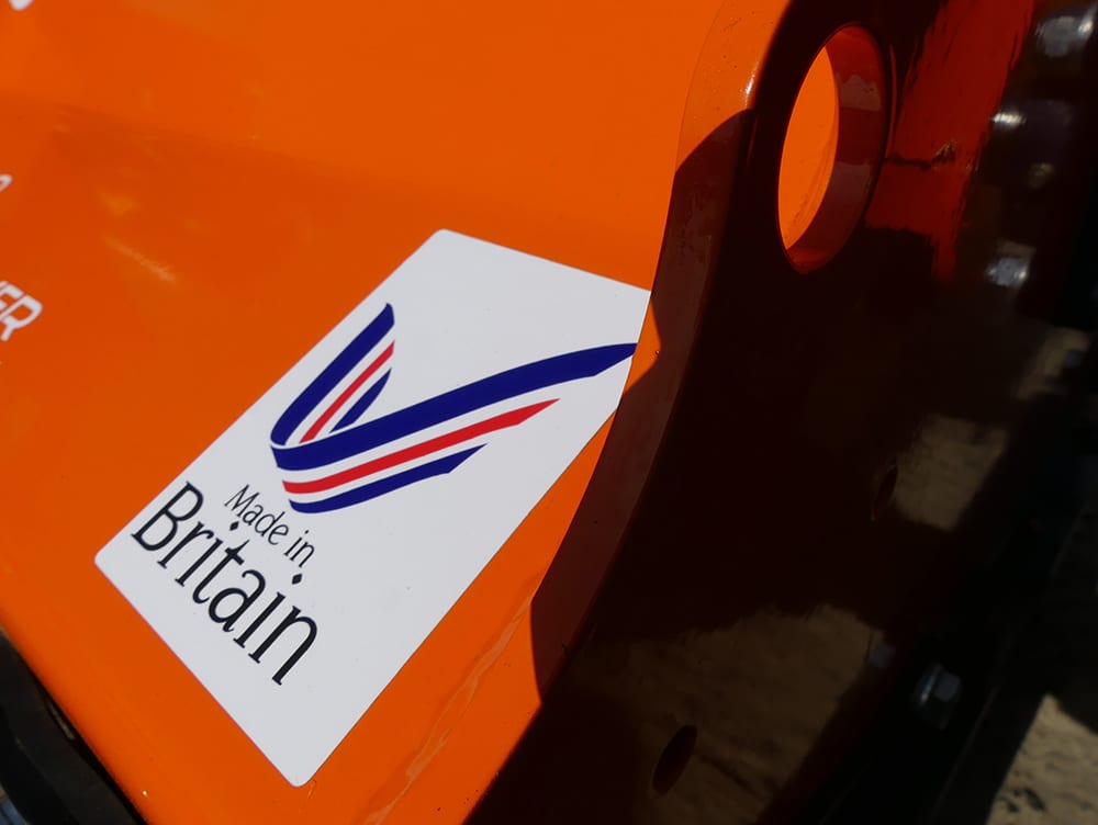 Flail mower attachment for ATV, bright orange with Made in Britain sticker