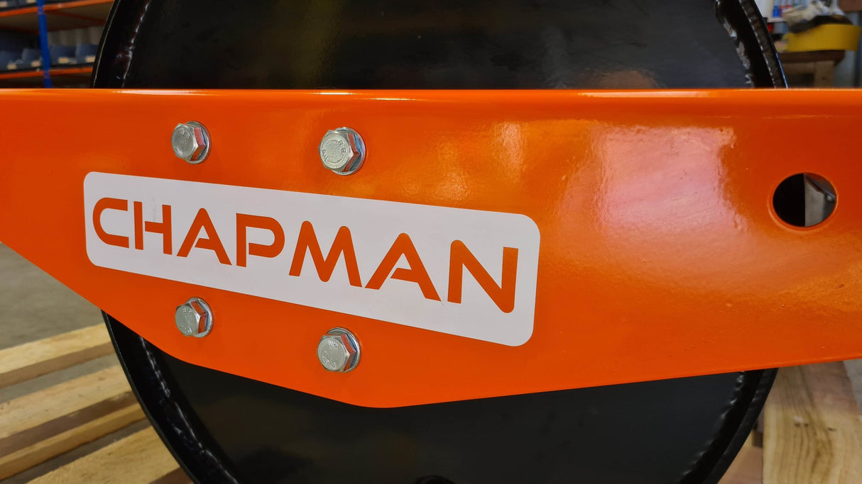 Chapman ATV land roller, orange metal frame with exposed bolts and CHAPMAN branding.