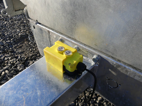 Chapman FT100 ATV trailer, flatbed tipping with electric tilt and yellow control box.