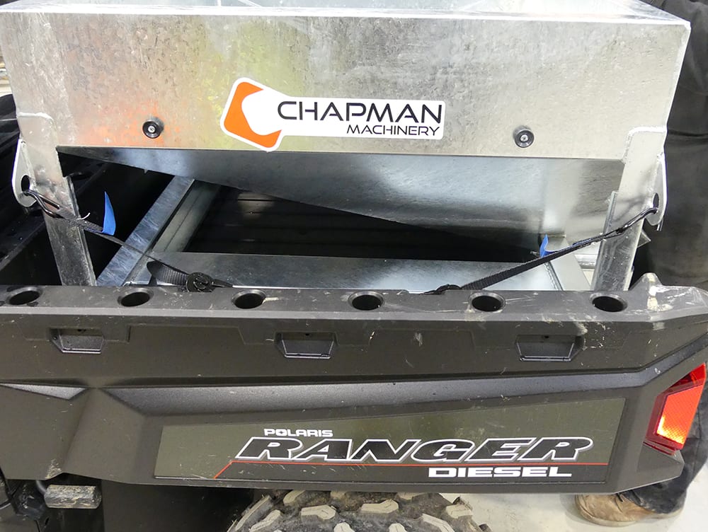 UTV-mounted stock feeder Chapman MF350, 300L, electric drive with digital counter; Chapman logo visible
