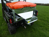 Chapman MF350 UTV-mounted stock feeder with orange tarp cover on green metal hopper