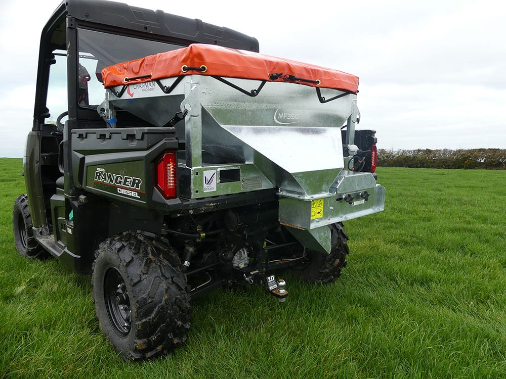 Chapman MF350 UTV Mounted Stock Feeder with galvanized hopper and orange cover.