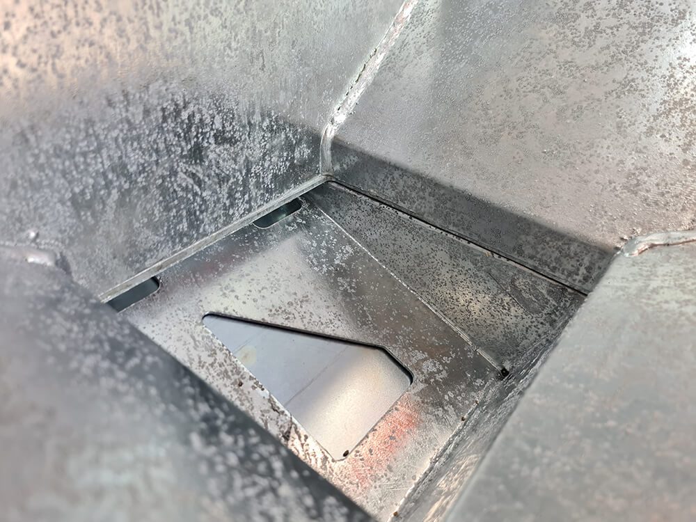 Chapman MGF350 mounted game feeder hopper interior, steel with rust speckling