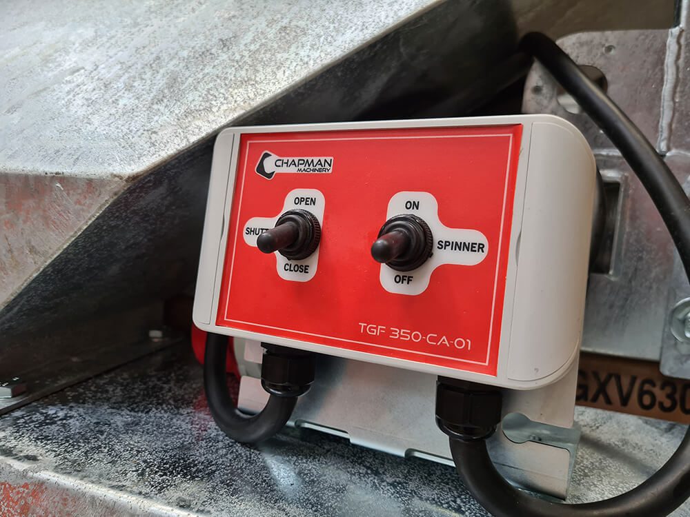 Chapman MGF350 mounted game feeder control box with red faceplate and two switches for open/close and spinner, 300L