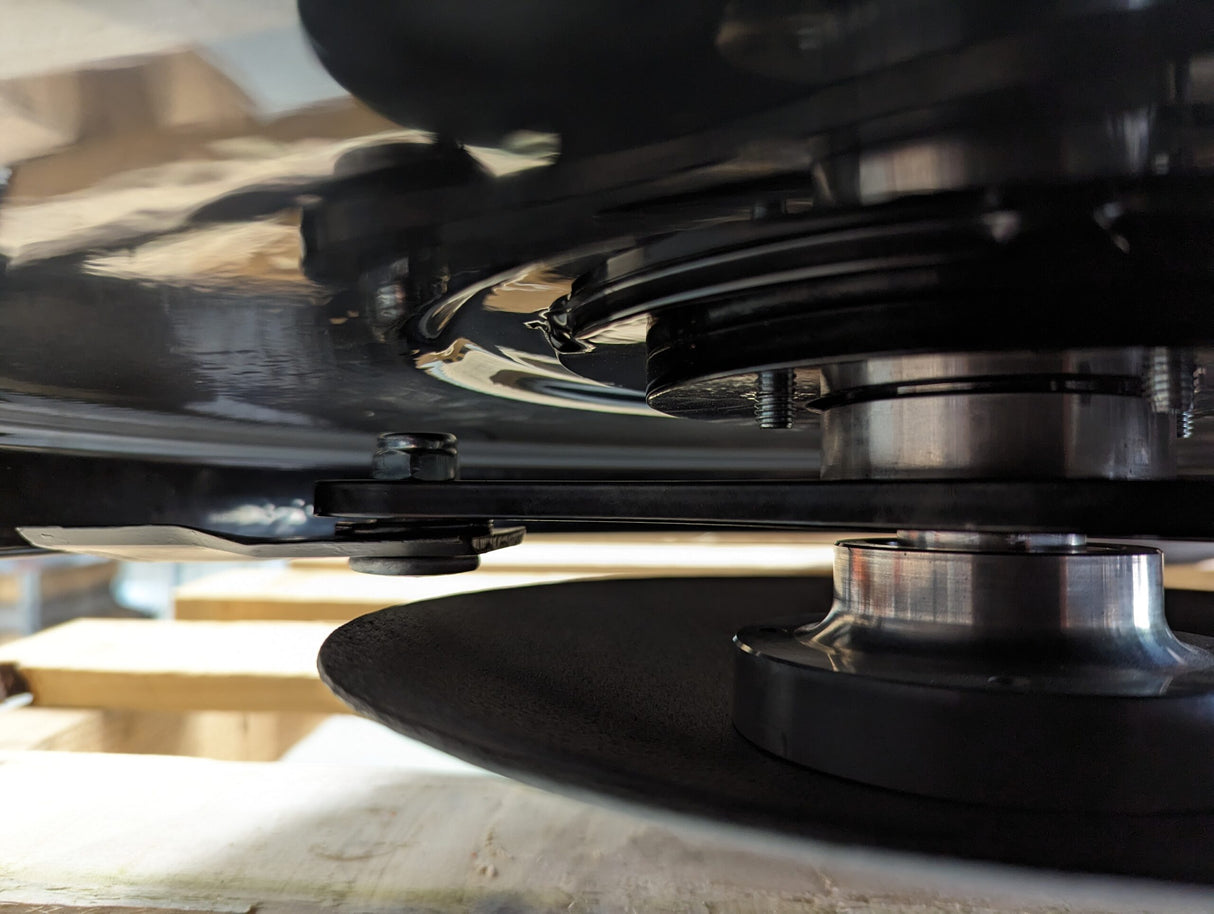 Chapman TS600 Pro ATV Trailed Strimmer undercarriage; black metal frame with twin pivoting heads.