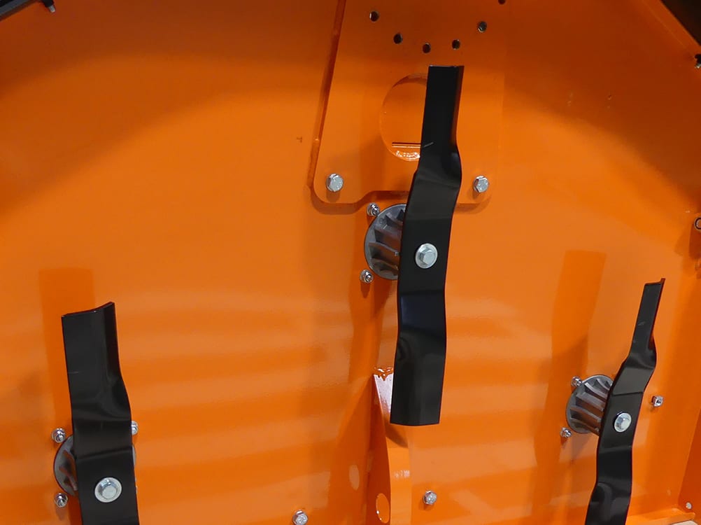 Chapman RM Series ATV Rotary Paddock Topper interior: orange housing with three black mounting straps and hub fittings