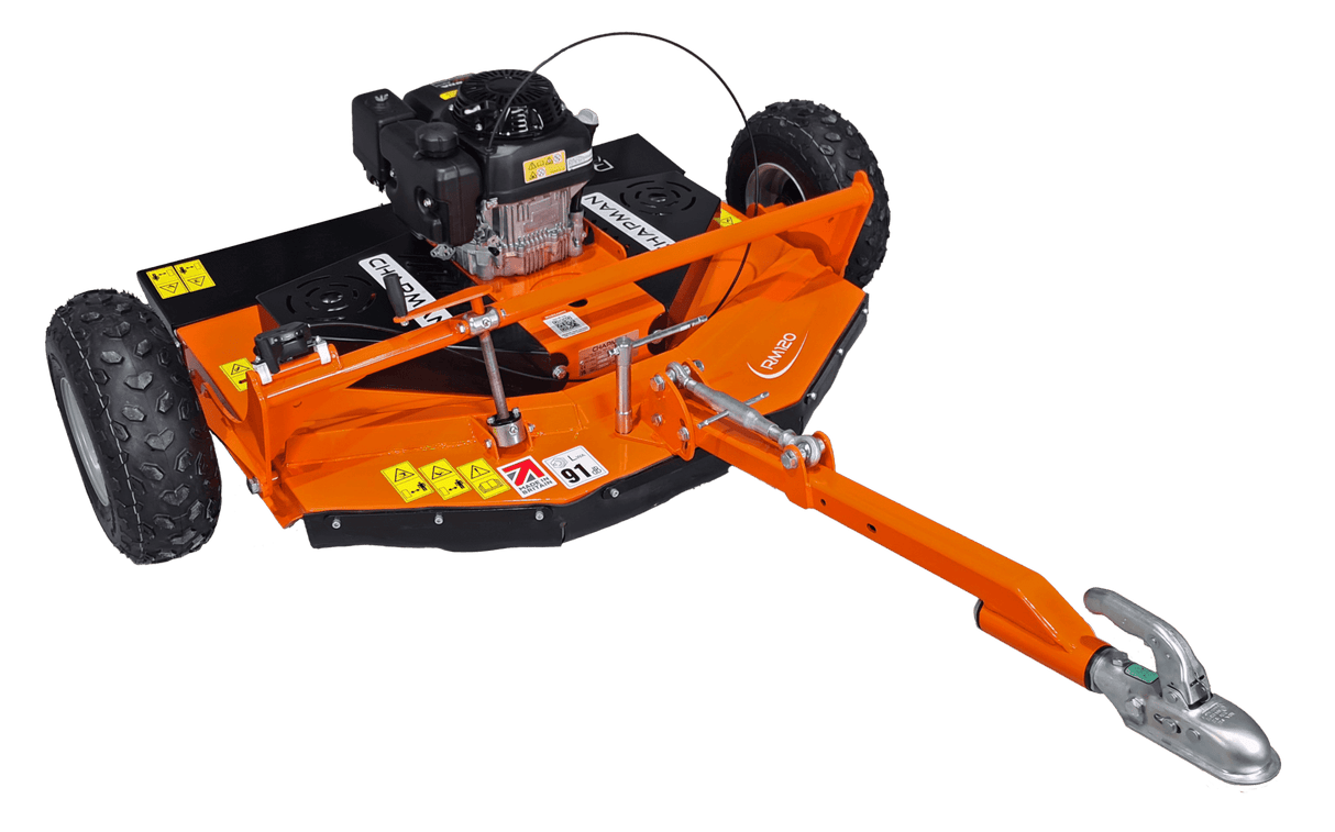 Chapman RM Series ATV Rotary Paddock Topper with Honda 13hp engine; orange mower deck, large knobby wheels.