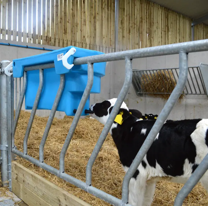 Blue 10-teat Calf Feeder EazyFlow Teat by JFC Agri mounted on a pen in a barn