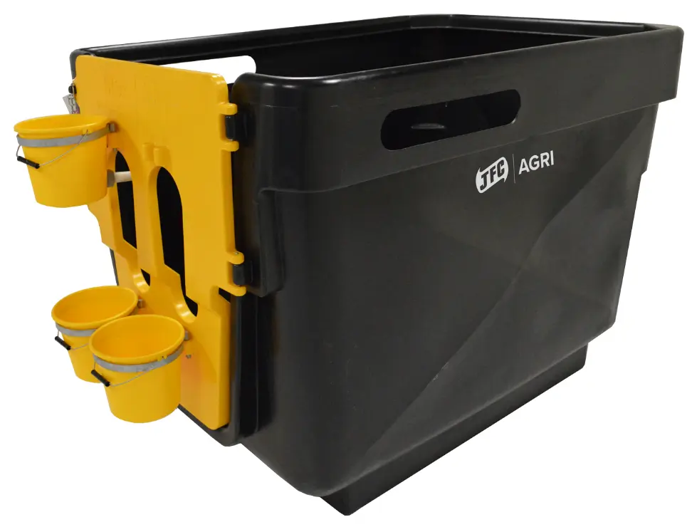 Calf housing unit CC-02 by JFC Agri, black indoor calf crib with yellow mounting panel and three yellow feed buckets.