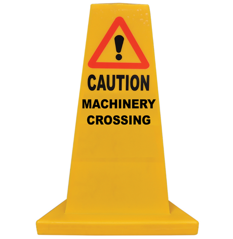 Yellow traffic cone with red warning triangle at the top and bold CAUTION MACHINERY CROSSING lettering along the cone.