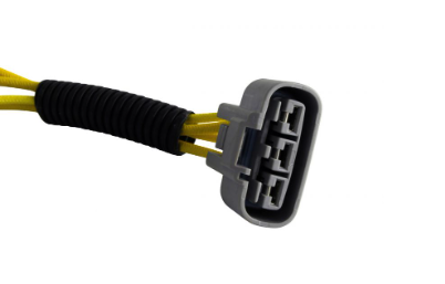 REVOLT voltage regulator connector with gray housing and two yellow wires