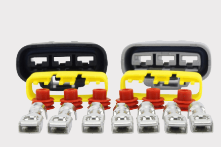 DGT Agri regulator rectifier pair for Can-Am Ryker 600/900 ACE EFI (2019–2021) with red terminals and yellow protective caps.