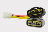 REVOLT Regulator Rectifier for Suzuki GSX-R/Hayabusa; black housing with yellow dual-plug connectors.