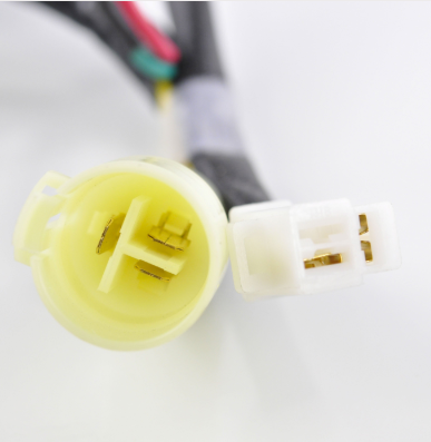 Voltage regulator harness connector for Honda TRX300 Fourtrax ATV; yellow round plug with white mating connector