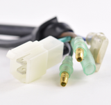High performance CDI module for Suzuki LT160E/LTF160 Quadrunner ATV; white 2-pin connector with green bullet terminals.
