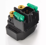 DGT Agri starter solenoid; black plastic body with green terminal blocks and brass studs.