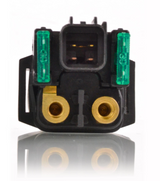 Starter solenoid for ATV with green fuse modules, black housing, and two brass terminals