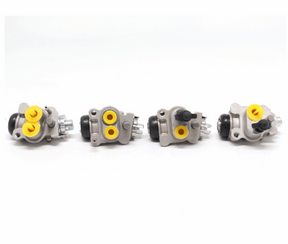 Four metallic gray brake cylinder sets with yellow plugs for Honda TRX350 Rancher (2000–2003).