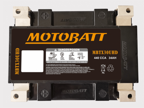 Motobatt MBTX30UHD battery with black case and orange Motobatt label, featuring 440 CCA and 34Ah.